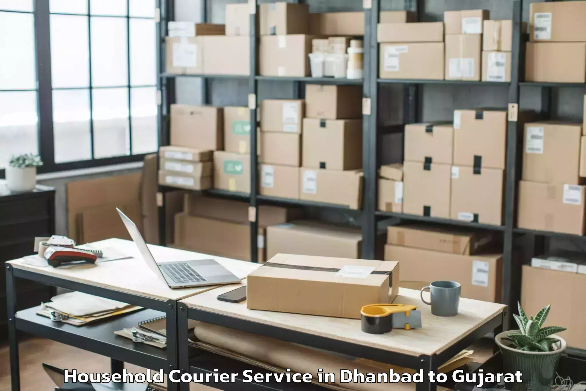 Easy Dhanbad to Valod Household Courier Booking